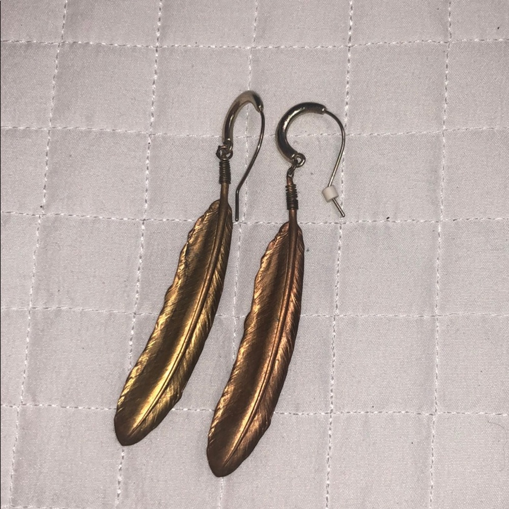 Gold feather earrings